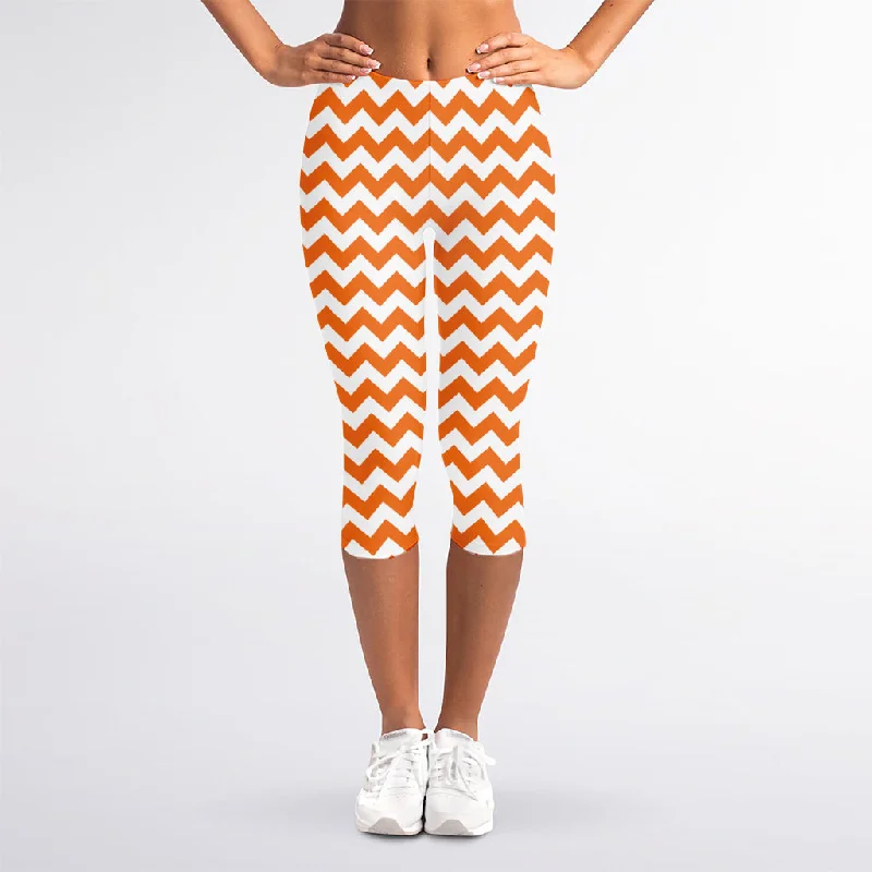Discount Days Orange And White Chevron Pattern Print Women's Capri Leggings